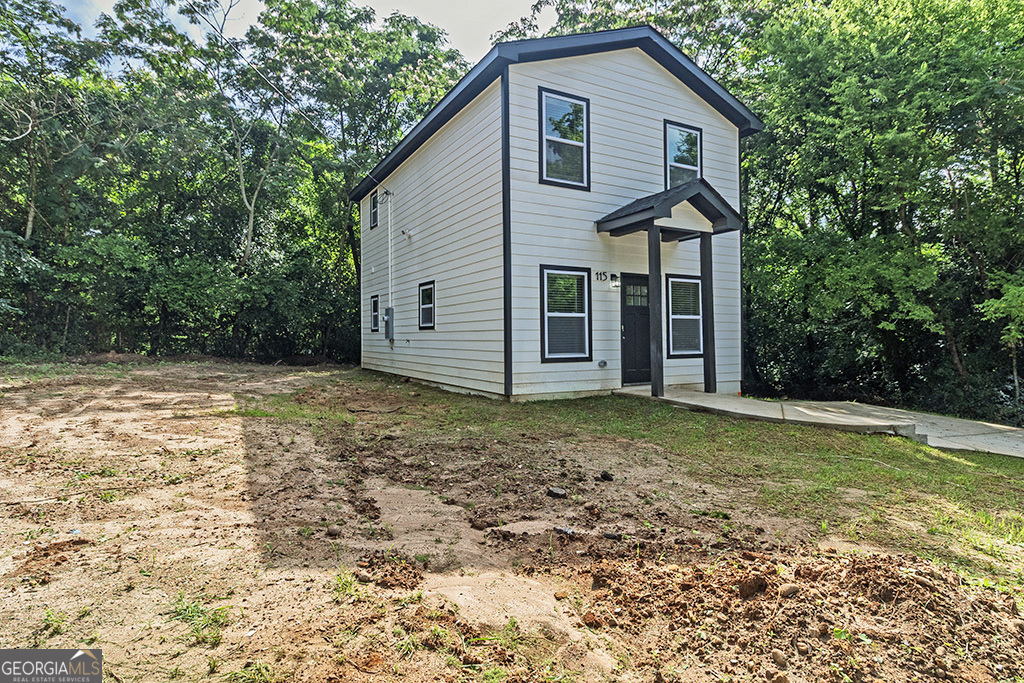 114 Emily Street Macon, GA 31204 - Photo 5 of 24 a view of a house with a yard