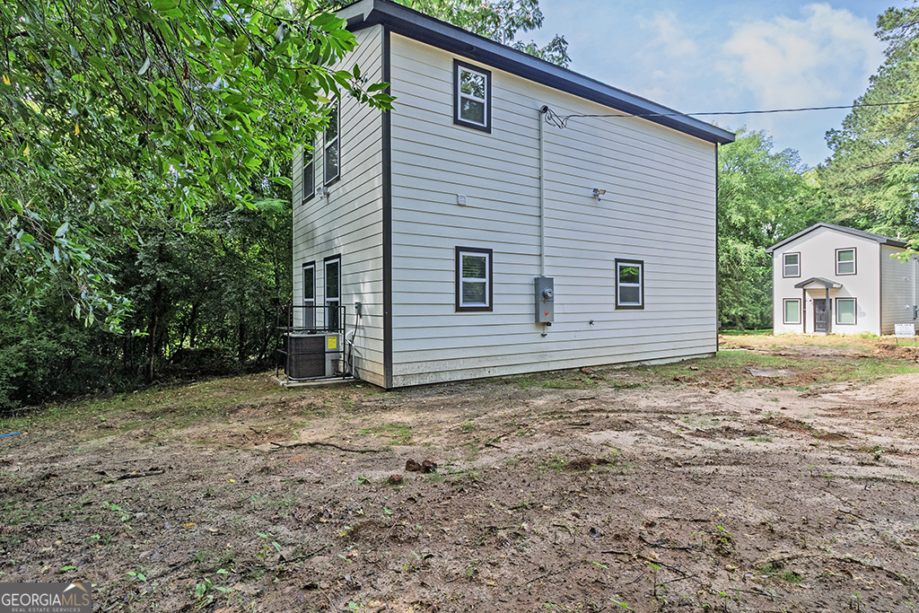 114 Emily Street Macon, GA 31204 - Photo 7 of 24 a house with trees in the background