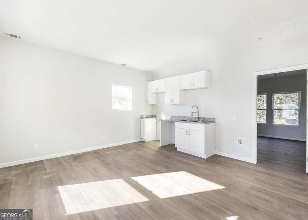 114 Emily Street Macon, GA 31204 - Photo 10 of 24 a view of kitchen with wooden floor