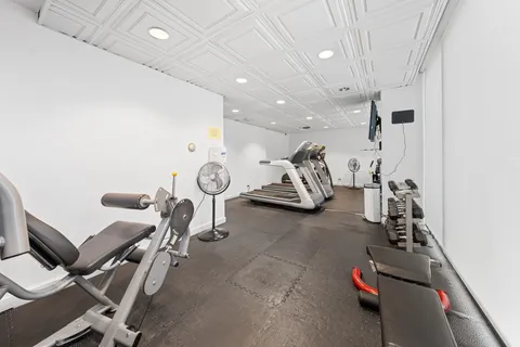 a view of a kitchen with a sink and dishwasher