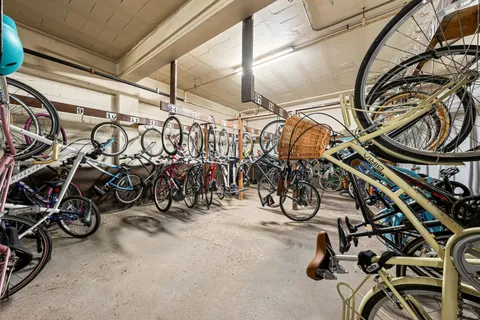 a view of a garage with cars