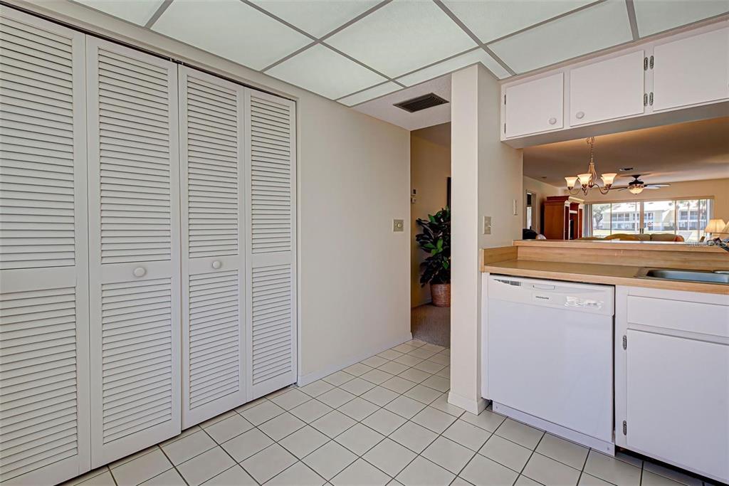 314 Cerromar Way, Unit 16 Venice, FL 34293 - Photo 14 of 47 a view of a kitchen from the hallway