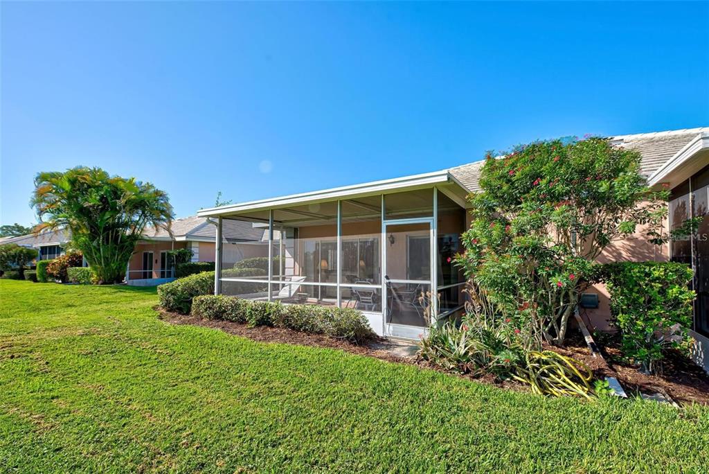 314 Cerromar Way, Unit 16 Venice, FL 34293 - Photo 39 of 47 a view of a backyard with plants