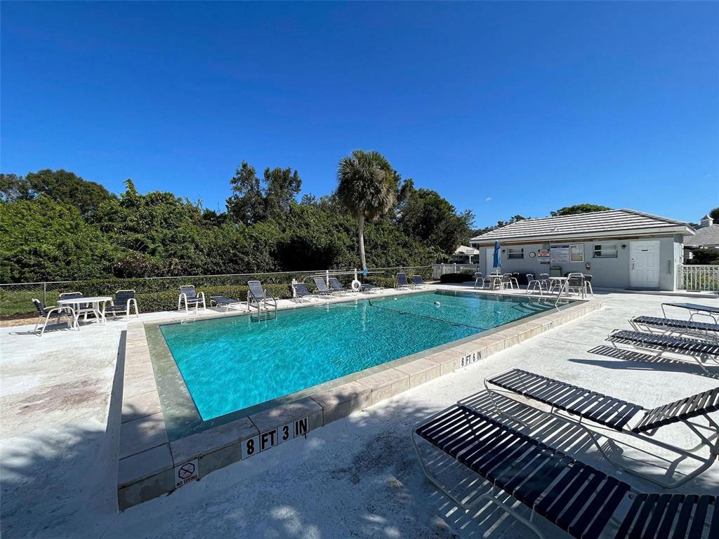 314 Cerromar Way, Unit 16 Venice, FL 34293 - Photo 43 of 47 a view of a swimming pool with a yard