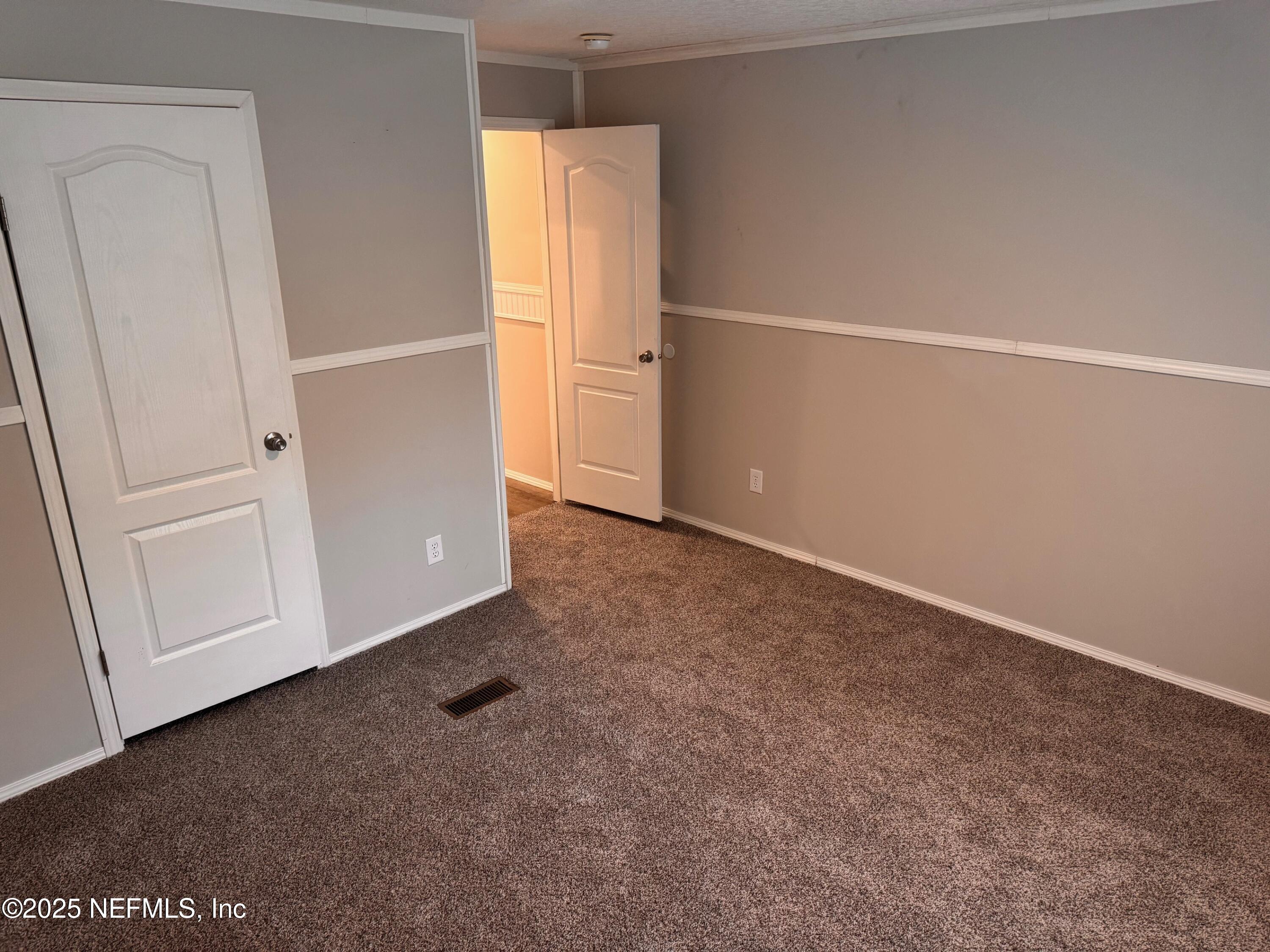95608 Clearwater Road Fernandina Beach, FL 32034 - Photo 24 of 32 an empty room with closet