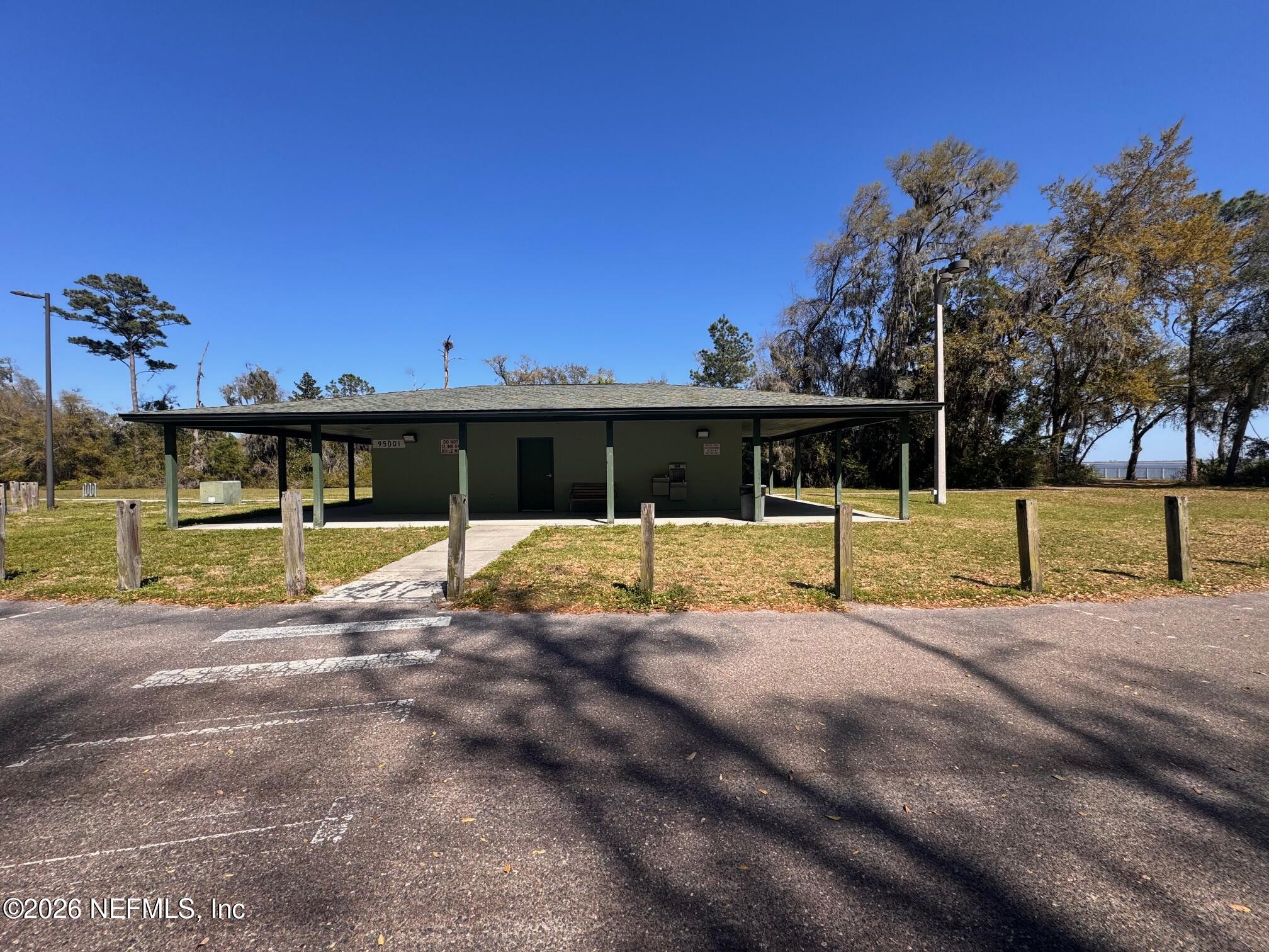 95608 Clearwater Road Fernandina Beach, FL 32034 - Photo 27 of 32 a view of swimming pool with a yard