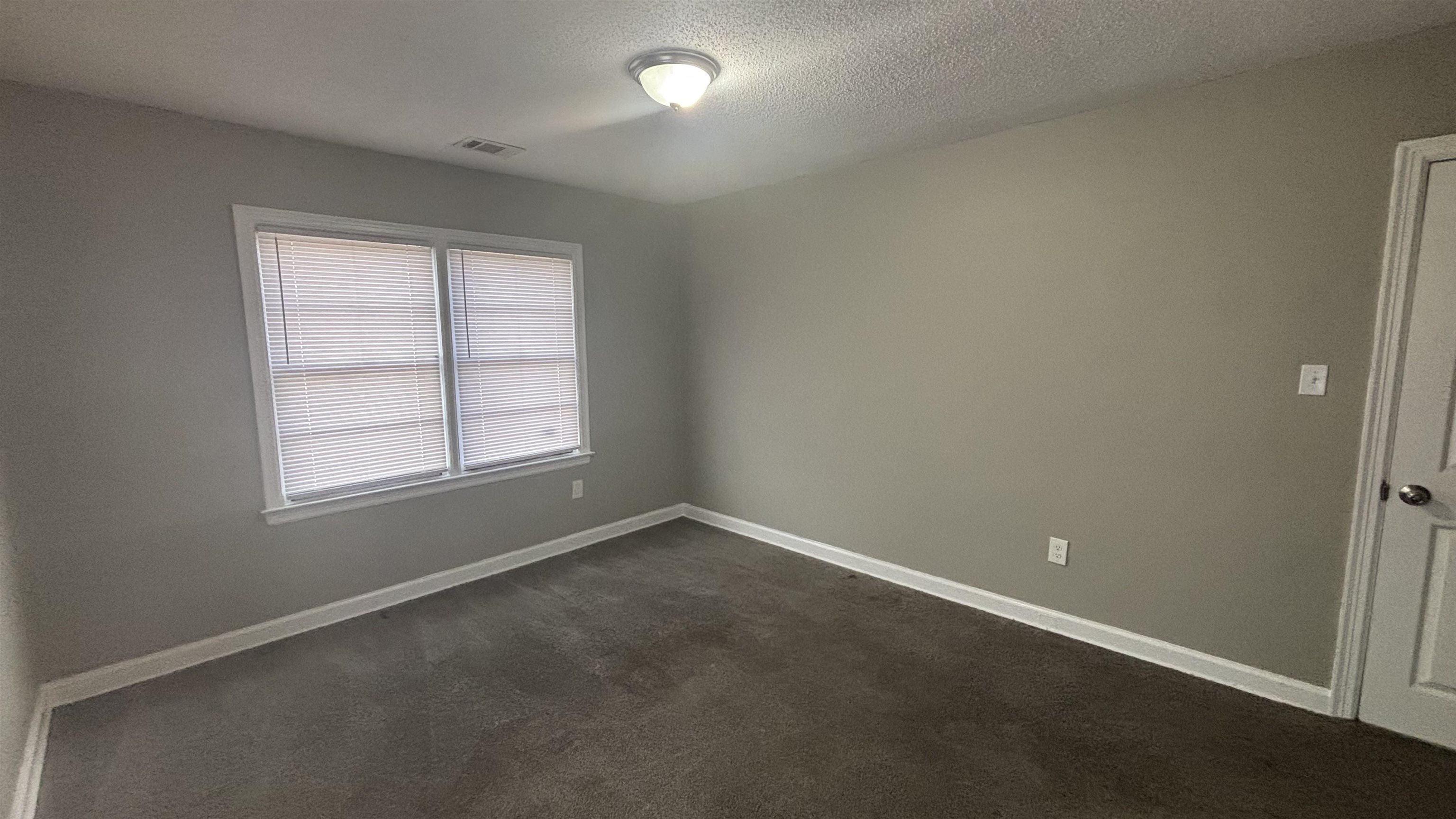 3133 Benjestown Road Memphis, TN 38127 - Photo 15 of 17 an empty room with a window