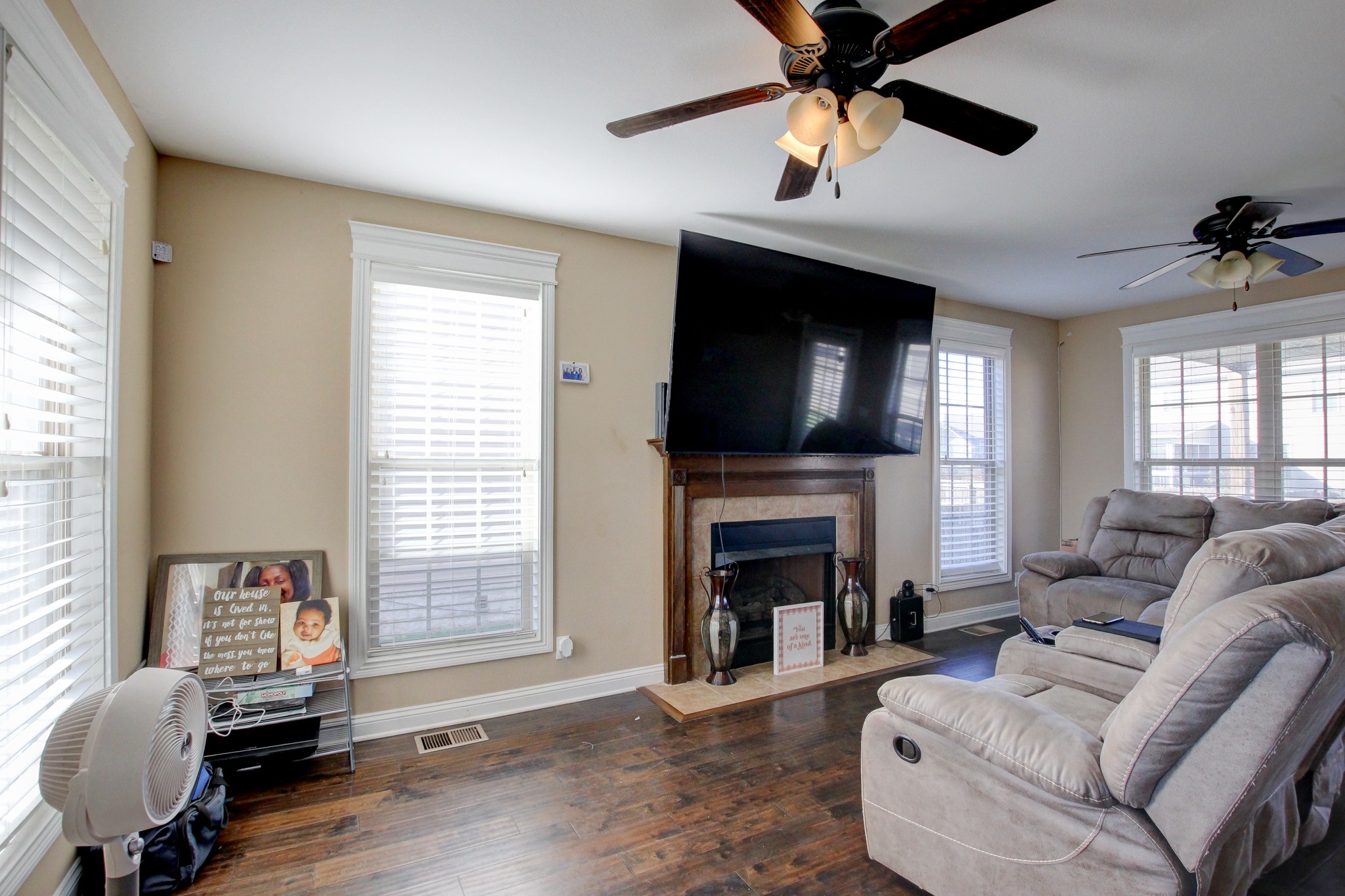 3776 Suiter Road Clarksville, TN 37040 - Photo 2 of 16 a living room with furniture and a fireplace