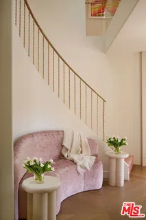 a view of a living room and dining room