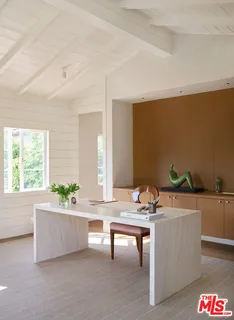 a living room with furniture and window