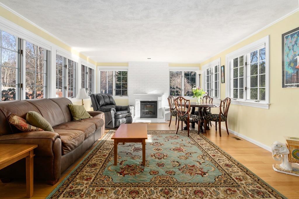 16 Spring Road Weston, MA 02493 - Photo 3 of 14 a living room with furniture and a dining table