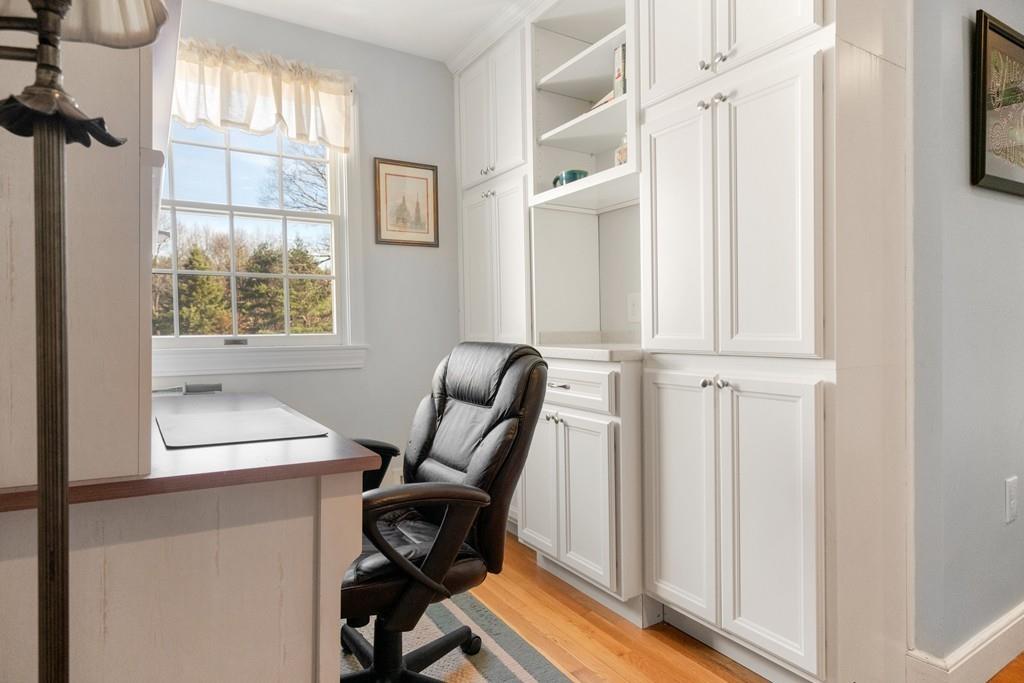 16 Spring Road Weston, MA 02493 - Photo 6 of 14 a view of a workspace with furniture and a window