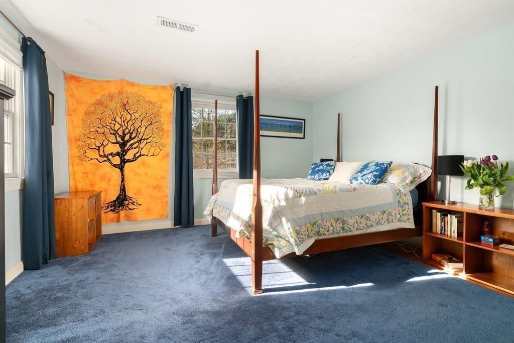 16 Spring Road Weston, MA 02493 - Photo 8 of 14 a bedroom with a bed table and window