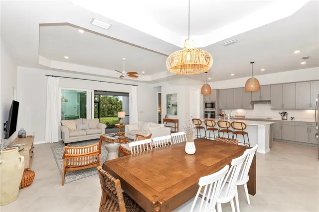 a bedroom with a bed and a television