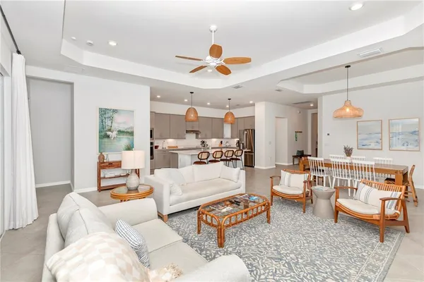 a bedroom with a bed and a flat tv screen on a table