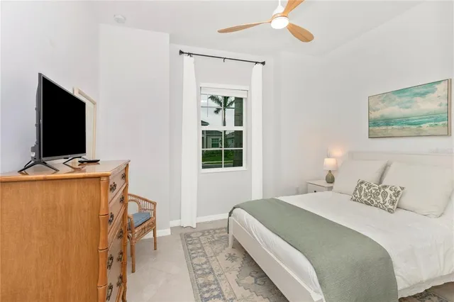 a building outdoor space with patio furniture and potted plants