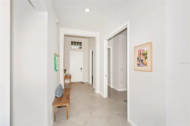 a kitchen with stainless steel appliances a sink a refrigerator and a stove