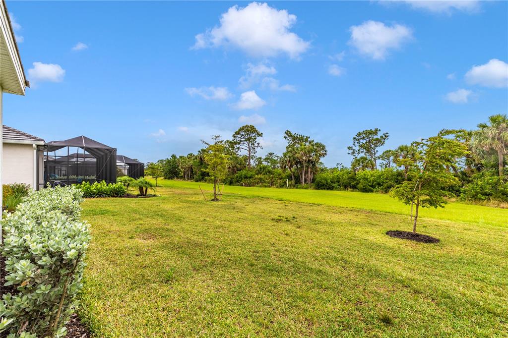 17475 Jadestone Court Venice, FL 34293 - Photo 42 of 100 a view of an ocean house in the background