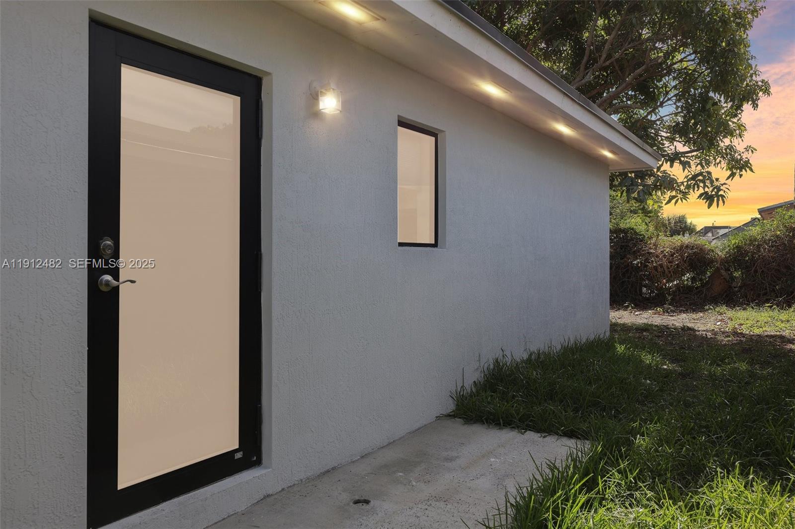 17003 Southwest 107th Place, Unit 2 Miami, FL 33157 - Photo 1 of 16 a backyard of a house