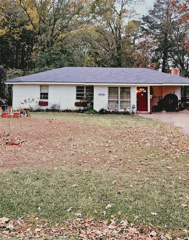 6766 Broadacres Road Shreveport, LA 71129 - Photo 1 of 20 a view of a house with a yard