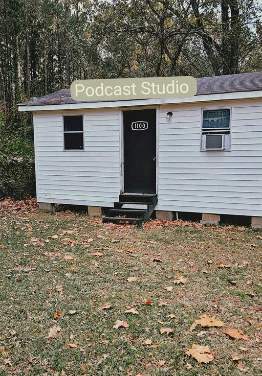 6766 Broadacres Road Shreveport, LA 71129 - Photo 16 of 20 a view of a house with a yard