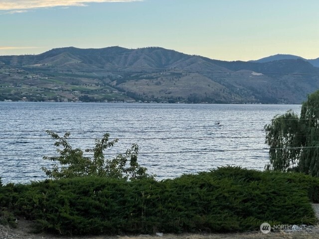 304 Highway 150, Unit 1A Chelan, WA 98816 - Photo 21 of 25 a view of lake and mountain
