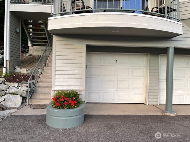 304 Highway 150, Unit 1A Chelan, WA 98816 - Photo 23 of 25 a front view of a house with an outdoor space