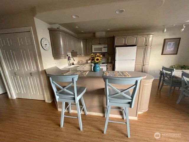 304 Highway 150, Unit 1A Chelan, WA 98816 - Photo 7 of 25 a view of a dining room with furniture
