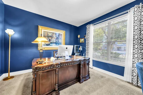 a kitchen with a sink cabinets and window