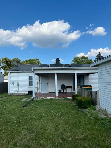 a view of a yard in front of a house