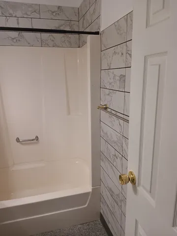 a bathroom with a bathtub