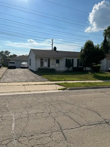 a view of a house with a swimming pool