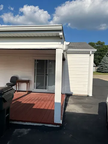 a front view of a house with a garage