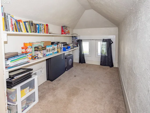 a kitchen that has a lot of cabinets in it