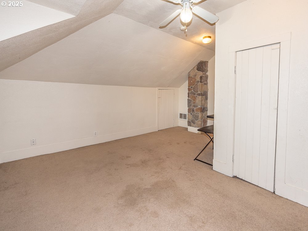 410 East Yacolt Road Yacolt, WA 98675 - Photo 20 of 39 an empty room with a ceiling fan and carpet