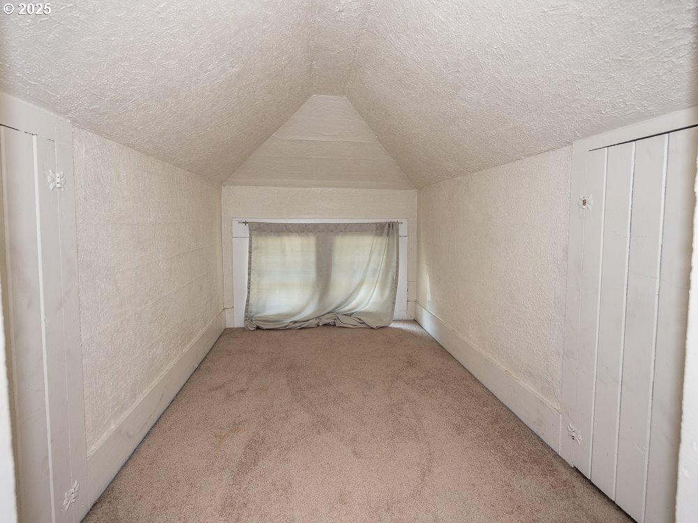 410 East Yacolt Road Yacolt, WA 98675 - Photo 21 of 39 a view of an empty room with a window