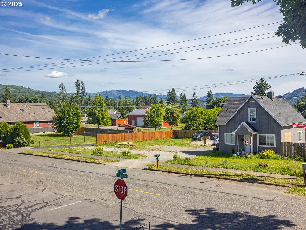 410 East Yacolt Road Yacolt, WA 98675 - Photo 22 of 39 a front view of a house with a yard