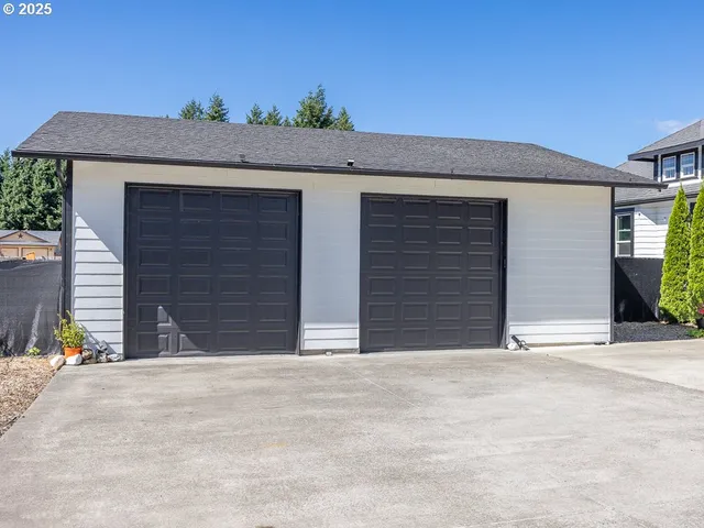 a front view of a house with a garage