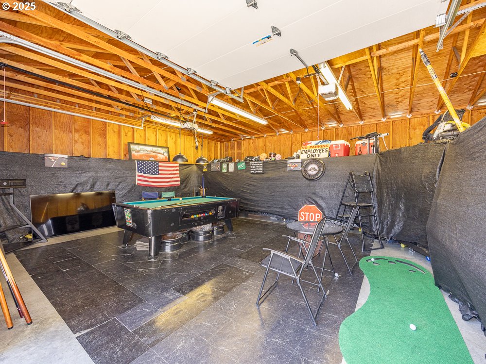 410 East Yacolt Road Yacolt, WA 98675 - Photo 26 of 39 a backyard of a house with table and chairs