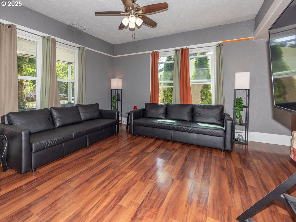 410 East Yacolt Road Yacolt, WA 98675 - Photo 3 of 39 a living room with furniture and wooden floor