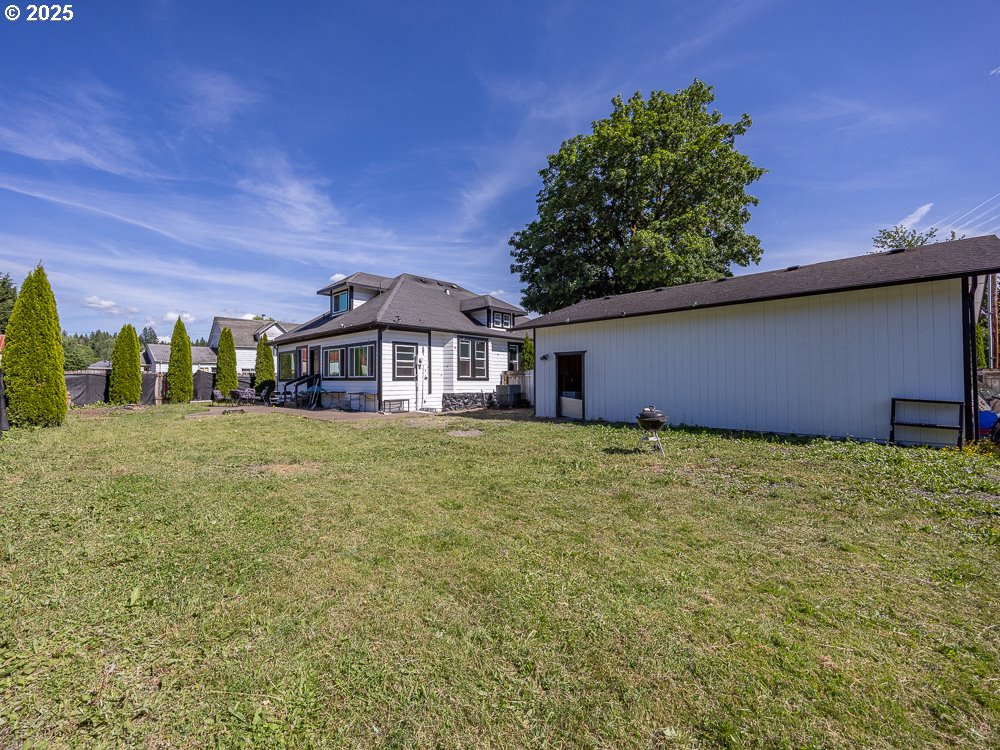 410 East Yacolt Road Yacolt, WA 98675 - Photo 32 of 39 a front view of a house with a garden