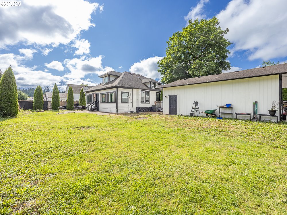 410 East Yacolt Road Yacolt, WA 98675 - Photo 36 of 39 a view of a house with a yard