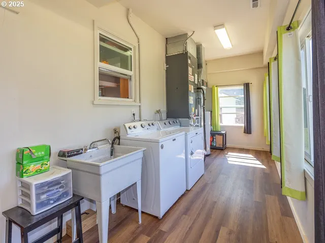 a spacious bathroom with a vanity a sink and a mirror