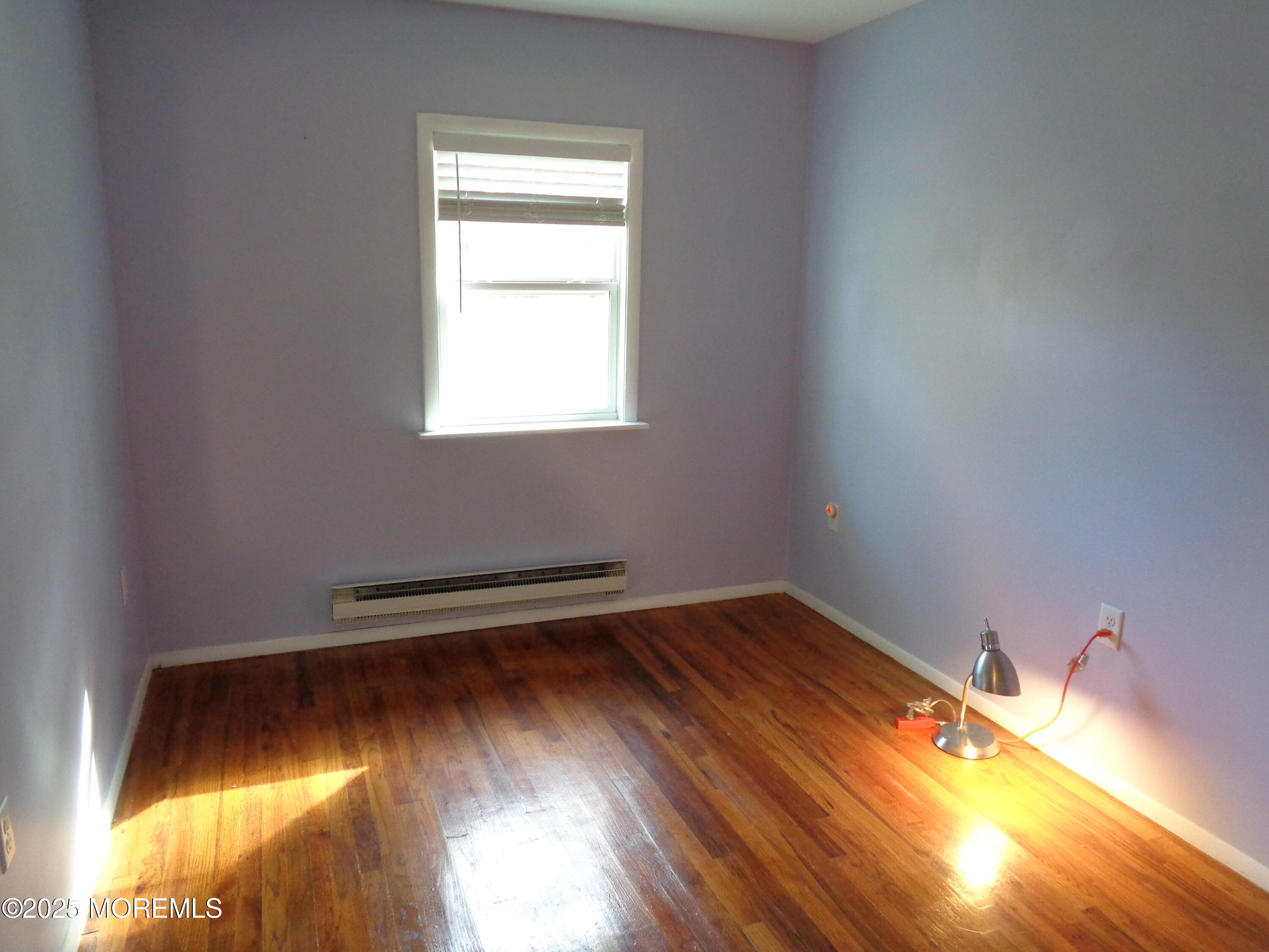 136 A Azalea Drive Whiting, NJ 08759 - Photo 12 of 21 a view of empty room with wooden floor