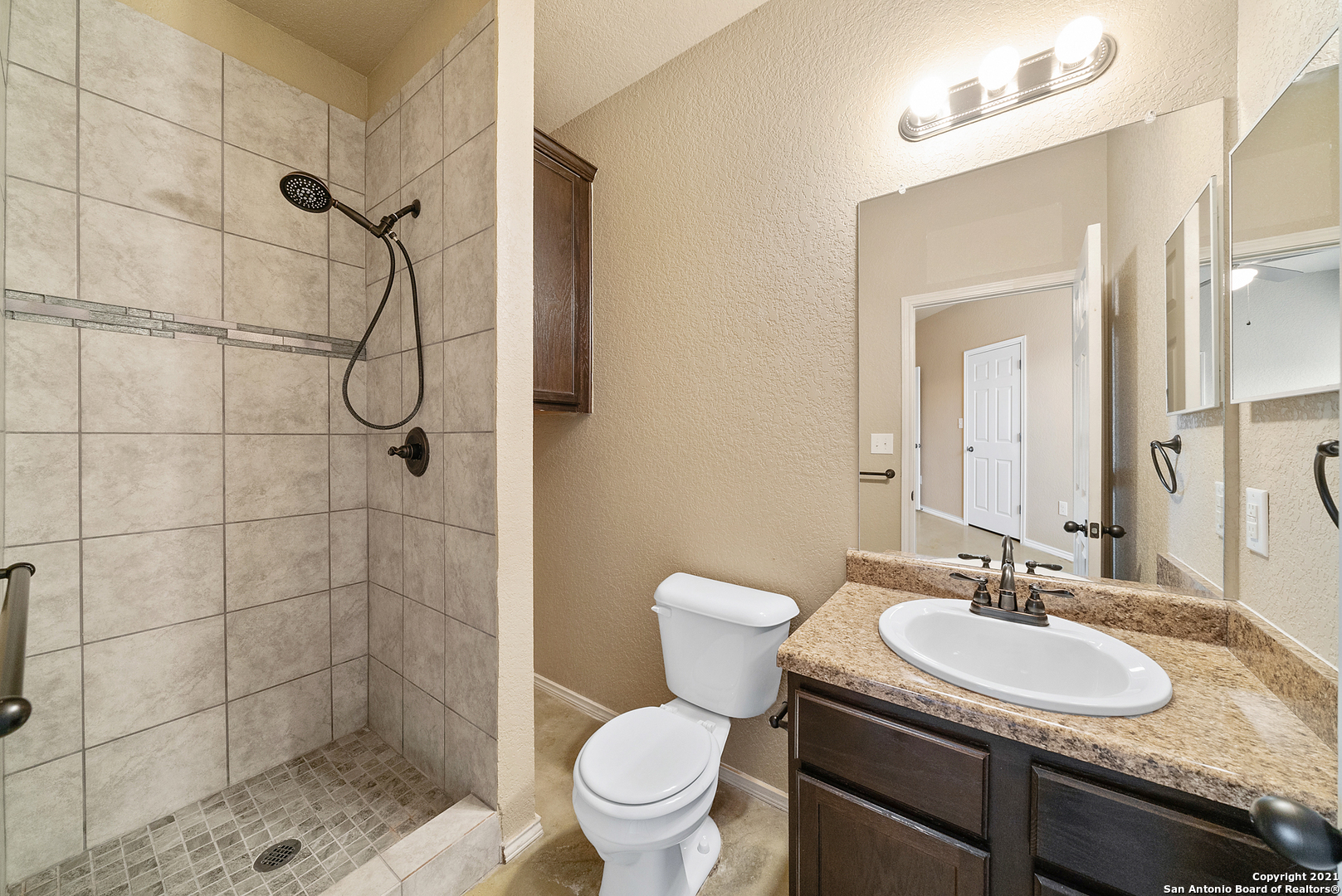1534 Lahn Road New Braunfels, TX 78130 - Photo 16 of 25 a bathroom with a sink toilet and shower