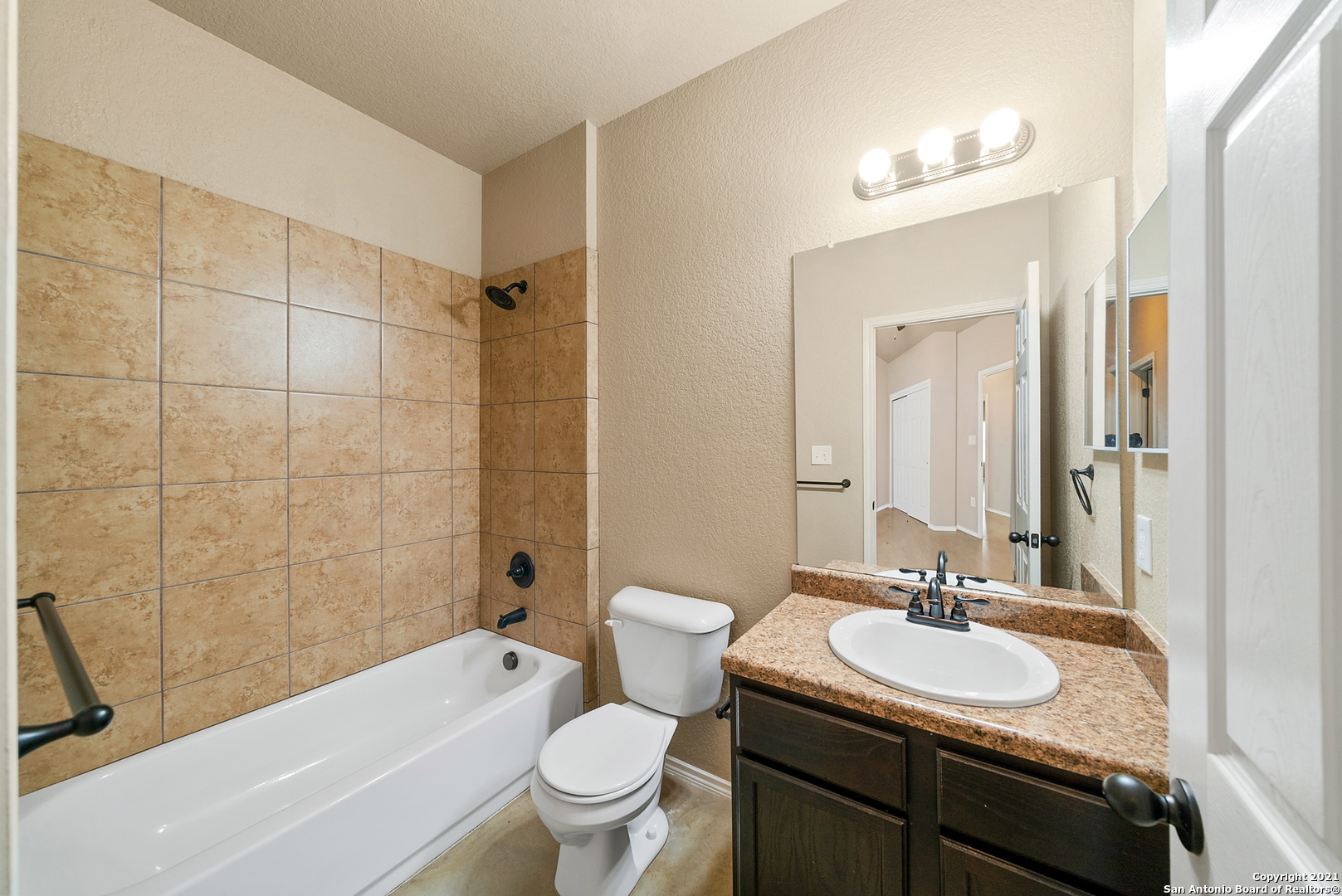 1534 Lahn Road New Braunfels, TX 78130 - Photo 19 of 25 a bathroom with a sink toilet tub and shower