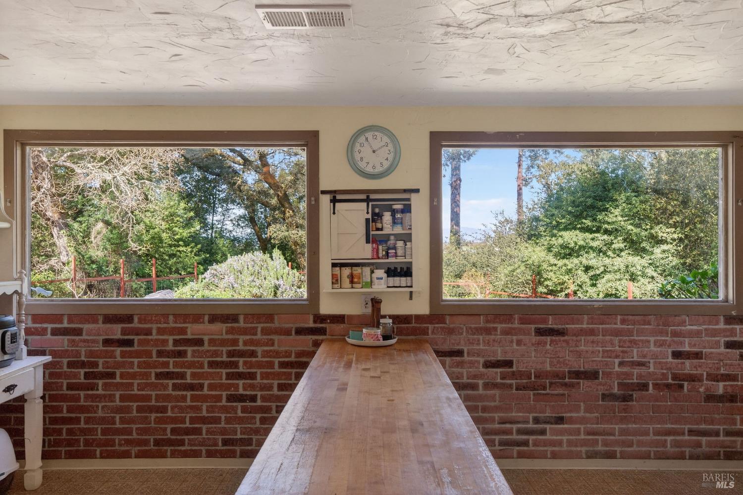 1450 Timberhill Road Santa Rosa, CA 95401 - Photo 12 of 50 a view of a large door with wooden floor