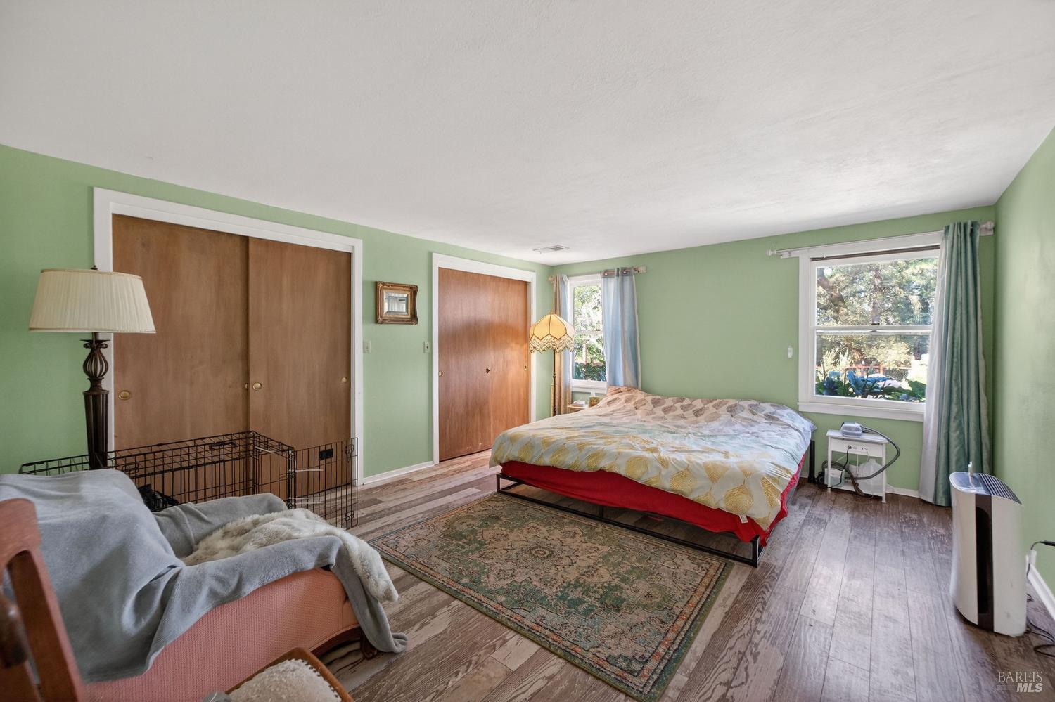 1450 Timberhill Road Santa Rosa, CA 95401 - Photo 14 of 50 a bedroom with a bed and a window