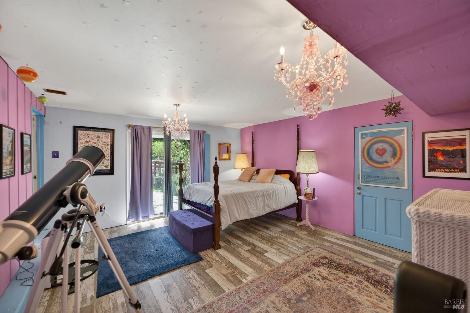 1450 Timberhill Road Santa Rosa, CA 95401 - Photo 17 of 50 a bed room with a bed and a chandelier