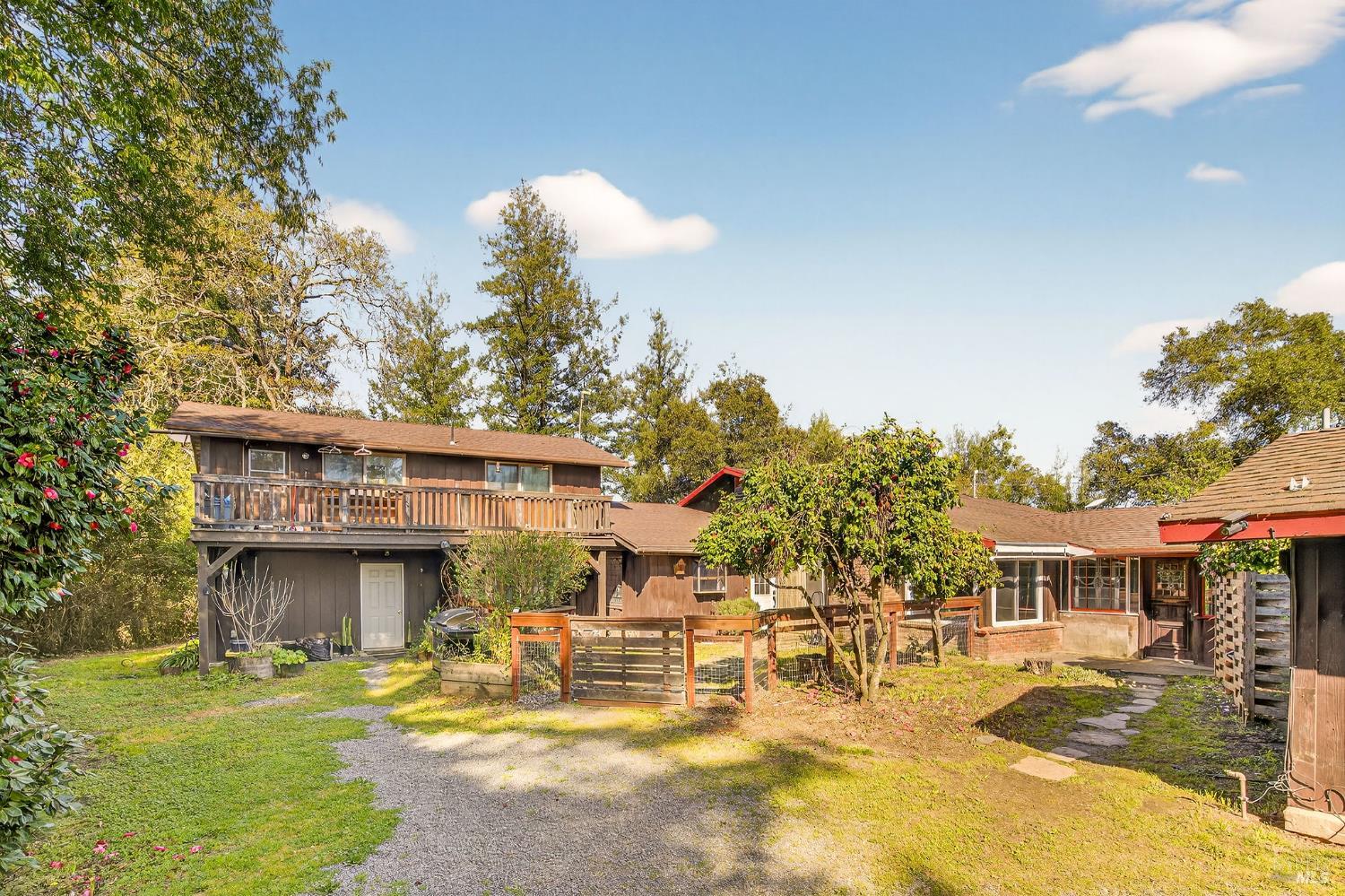 1450 Timberhill Road Santa Rosa, CA 95401 - Photo 2 of 50 a view of a house with swimming pool and sitting area